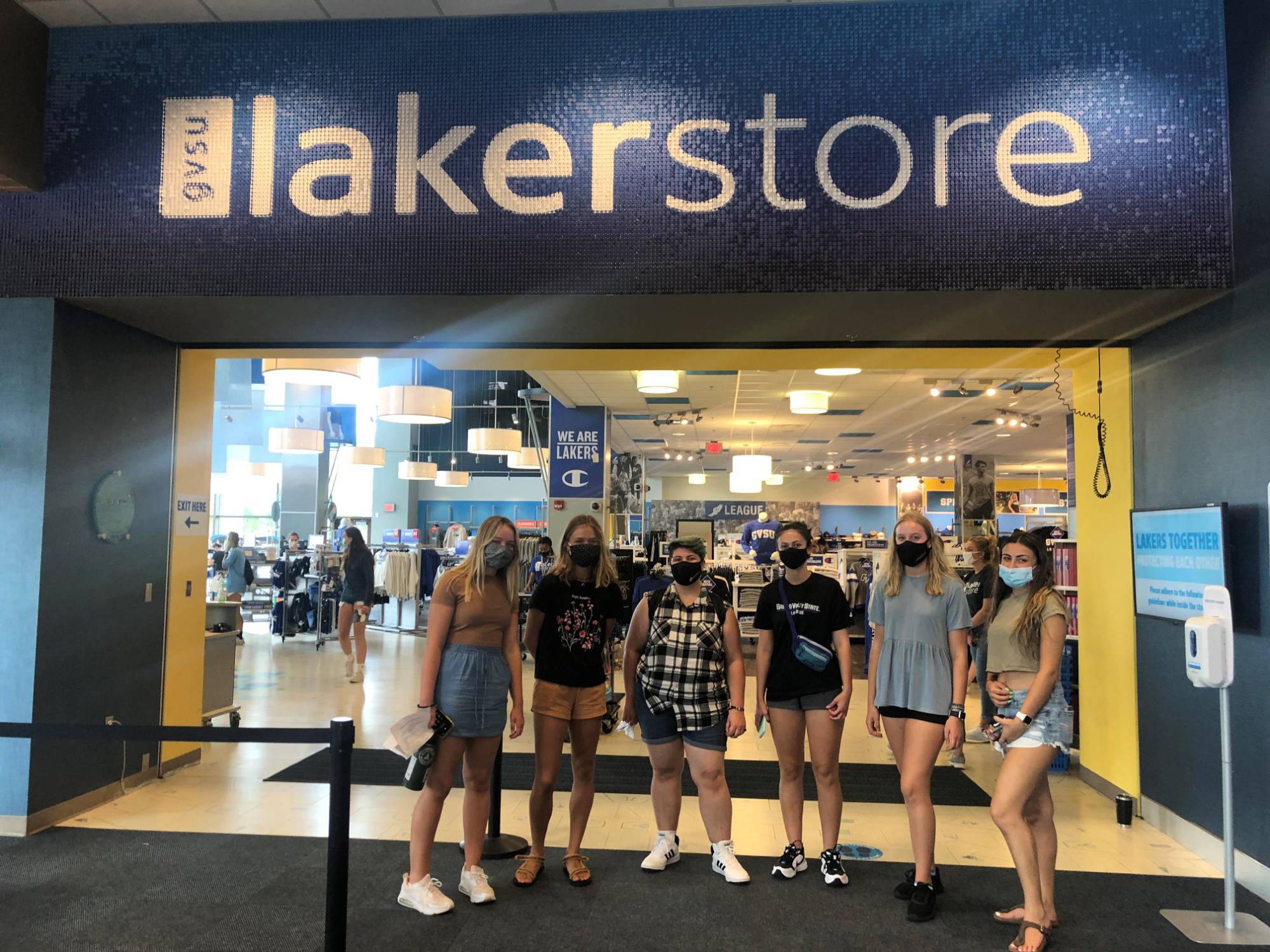 Students standing in front of the LakerStore